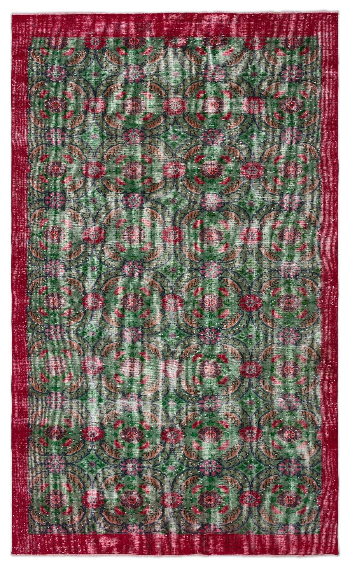 Distressed green and red rug with a repeating floral medallion pattern and a solid red border.