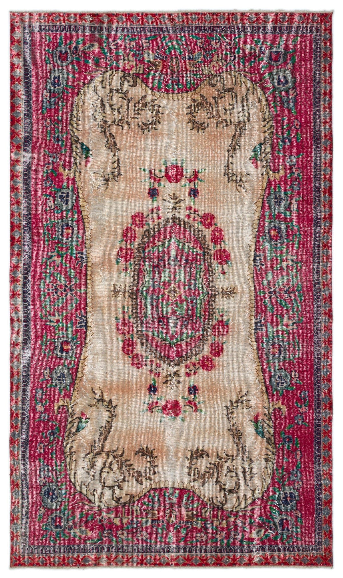 Distressed vintage-style rug with a central floral medallion, cream field, and deep red borders with ornate patterns.