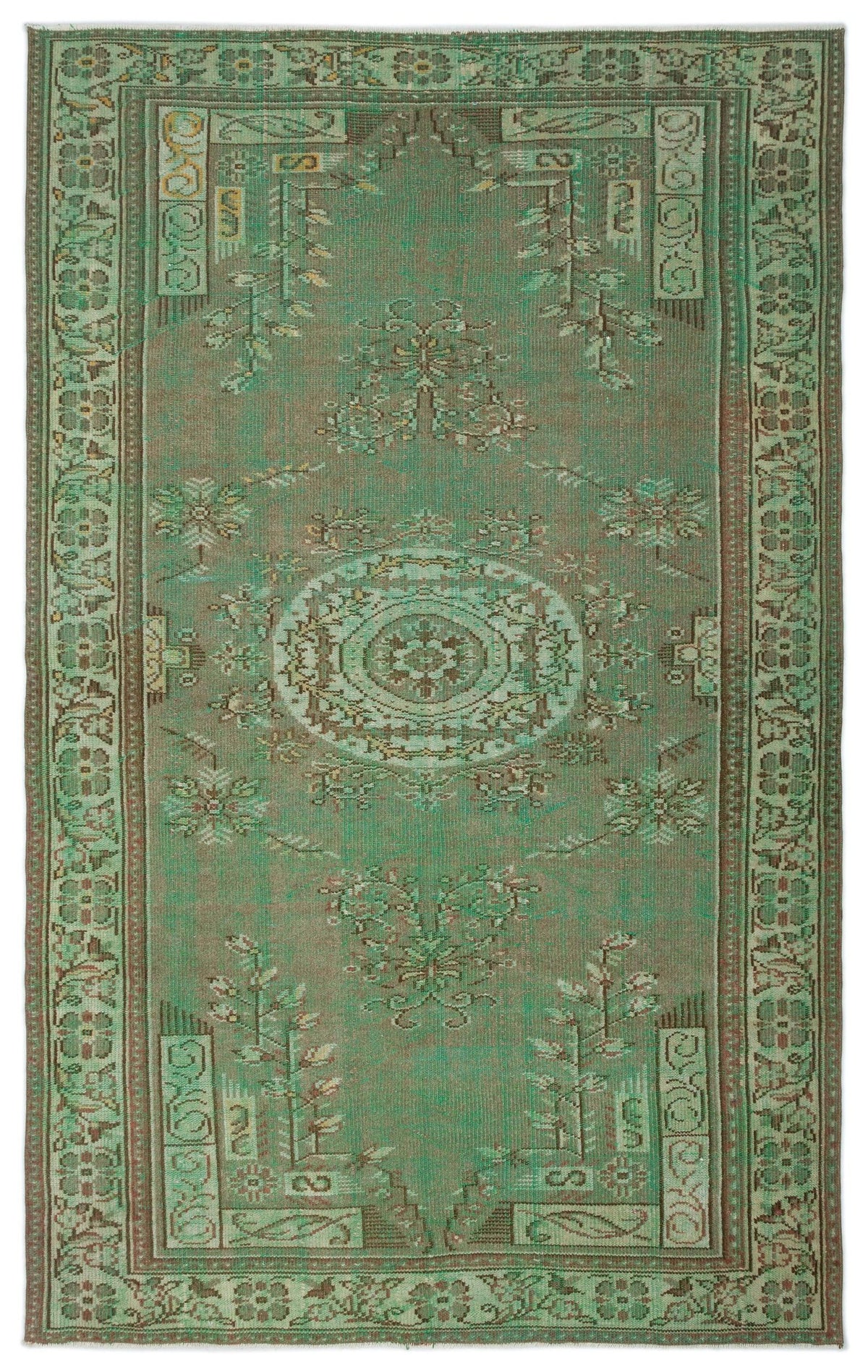 Sage green and brown distressed rug with a central medallion and traditional floral border pattern.