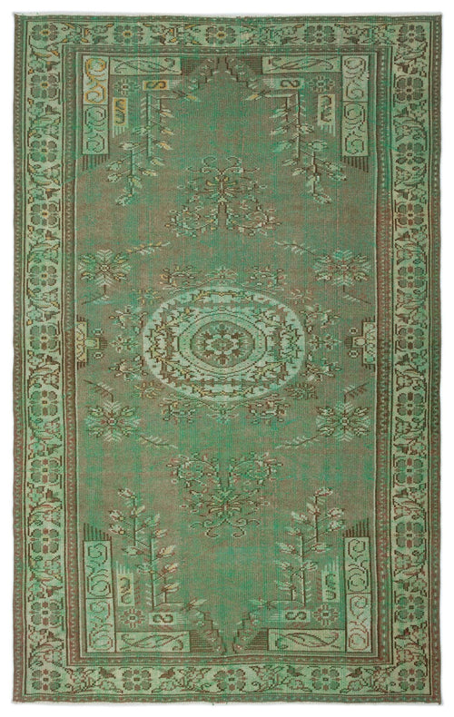 Load image 1 in gallery view. Sage green and brown distressed rug with a central medallion and traditional floral border pattern.