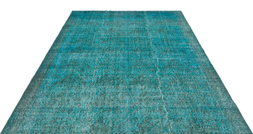 Load image 1 in gallery view. Teal and black distressed vintage-style rug with a faded, worn-in texture on a white background.