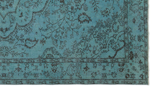 Load image 1 in gallery view. Teal rug with a distressed black floral pattern and a traditional border.