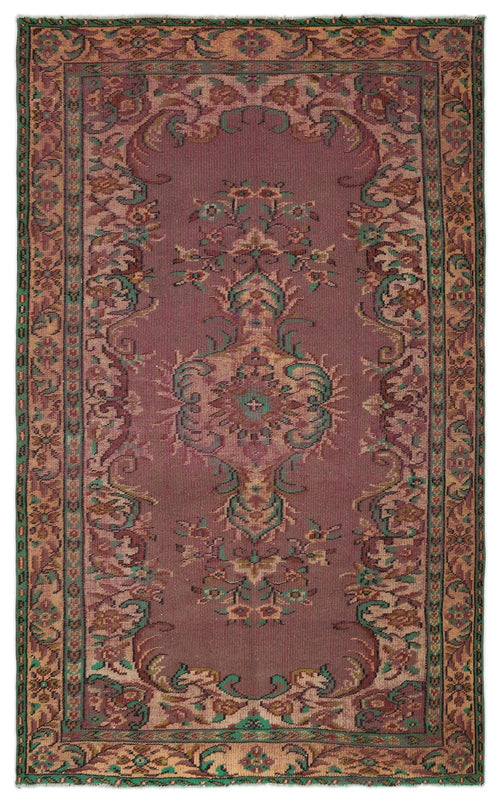 Load image 1 in gallery view. Mauve traditional rug with a central floral medallion, intricate border, and accents of sage green and tan.