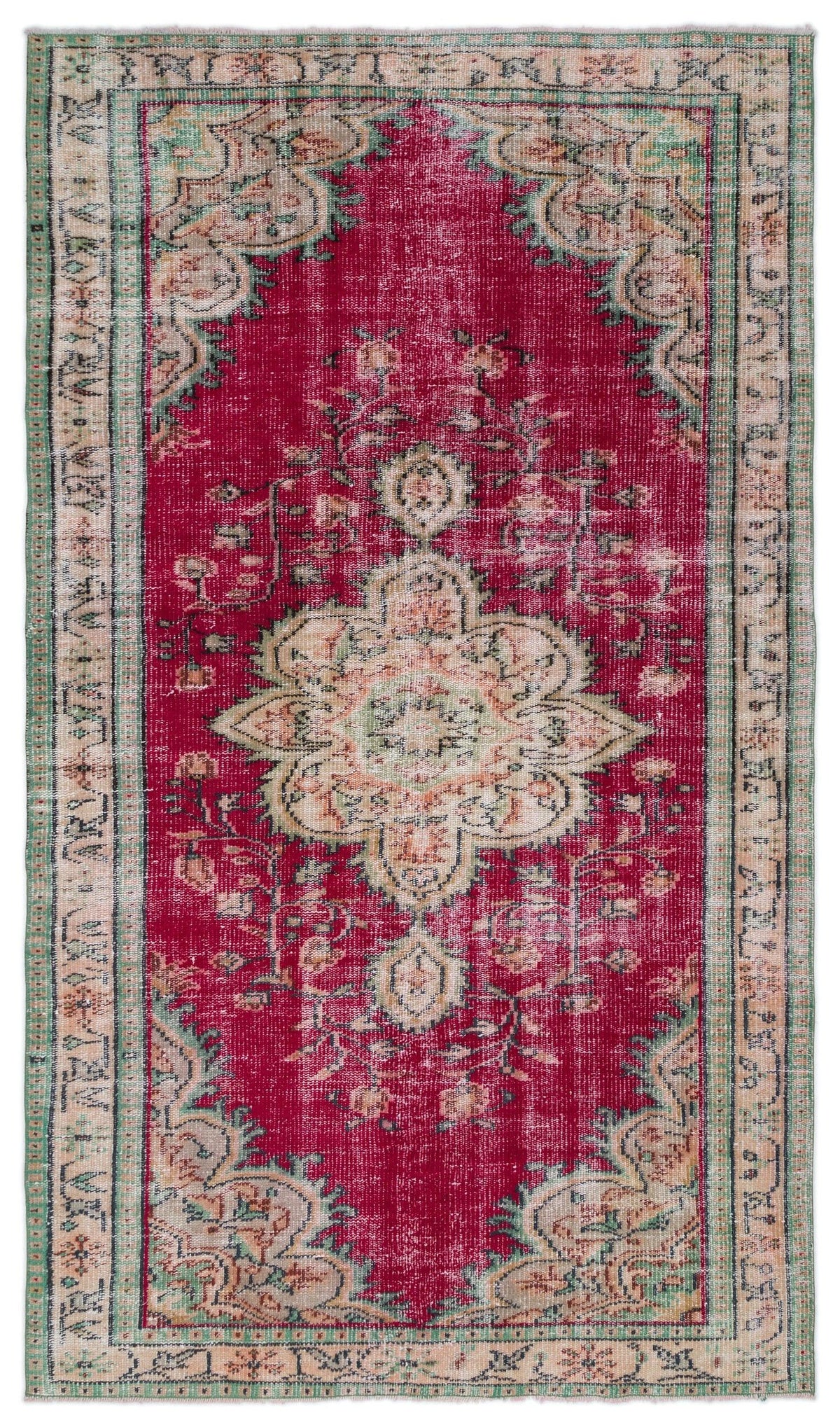 Distressed crimson rug with a central beige floral medallion and green geometric border.