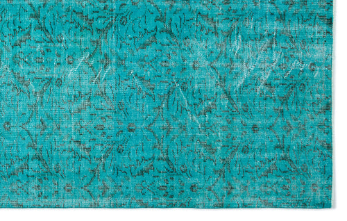 Load image 1 in gallery view. Teal rug with a distressed, dark grey traditional floral pattern on a white background.