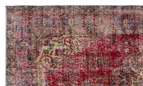 Load image 1 in gallery view. Distressed red, beige, and navy blue vintage-style rug with an intricate floral medallion pattern.