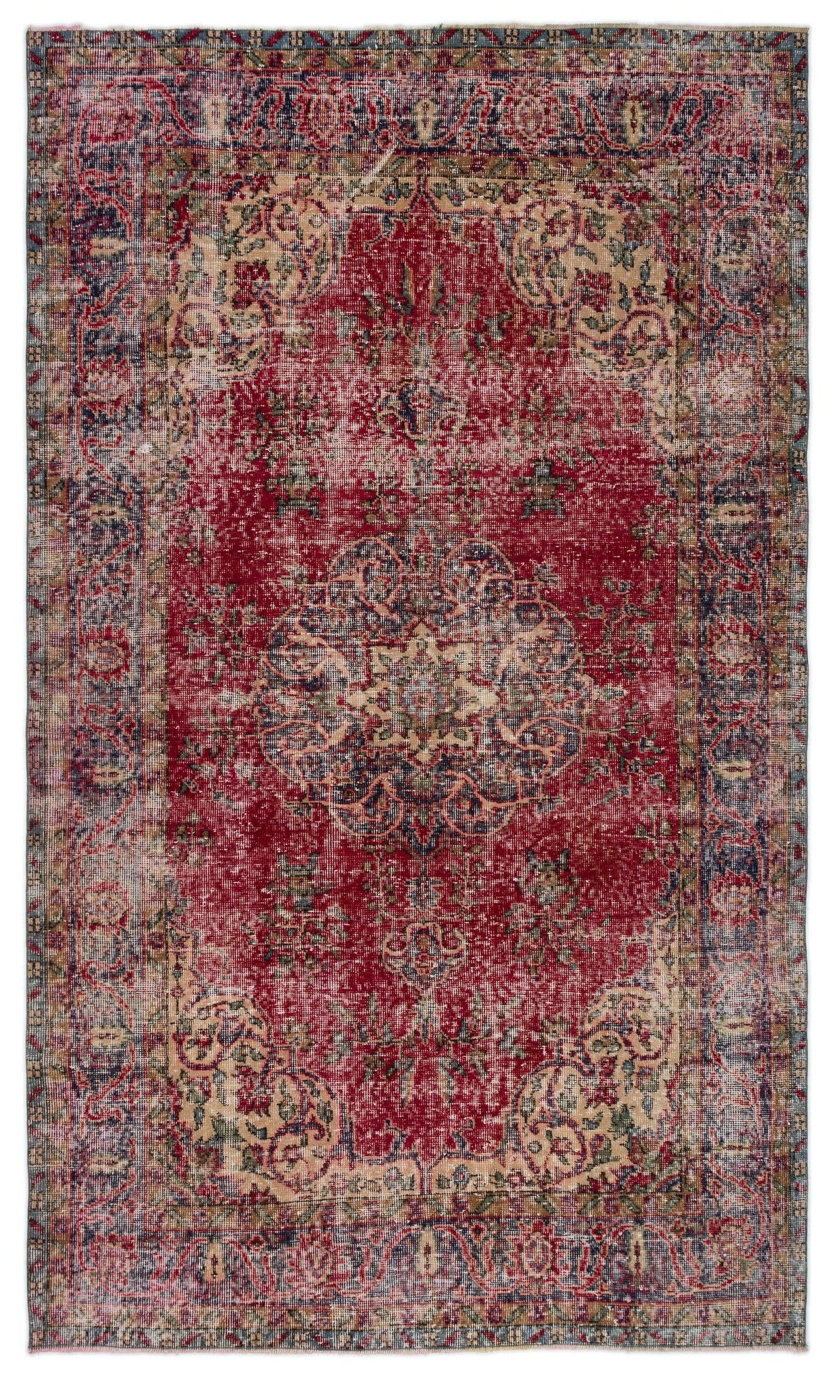 Distressed red, blue, and beige traditional rug with a central medallion and ornate floral border.