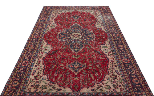 Load image 1 in gallery view. Red and navy blue traditional Persian-style rug with a central floral medallion and intricate border on a white background.