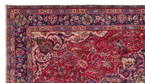 Load image 1 in gallery view. Traditional red and navy blue Persian-style rug with intricate floral borders and a central botanical pattern.