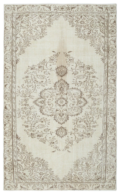 Load image 1 in gallery view. Cream and taupe vintage-style rug with a central floral medallion and ornate border on a white background.
