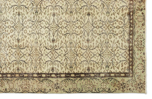 Load image 1 in gallery view. Beige and sage green rug with a dark brown floral trellis pattern and a wide decorative border.