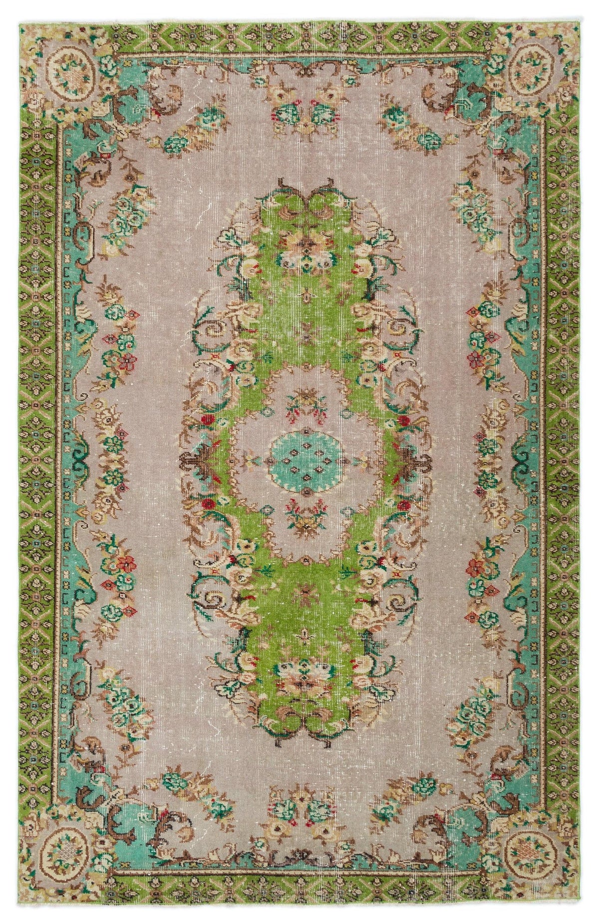 Distressed taupe rug with a central green floral medallion and ornate geometric border in shades of green and red.