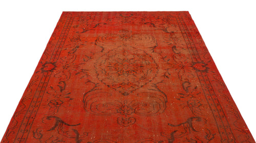 Load image 1 in gallery view. Distressed red rug with a dark brown central floral medallion and ornate border pattern on a white background.