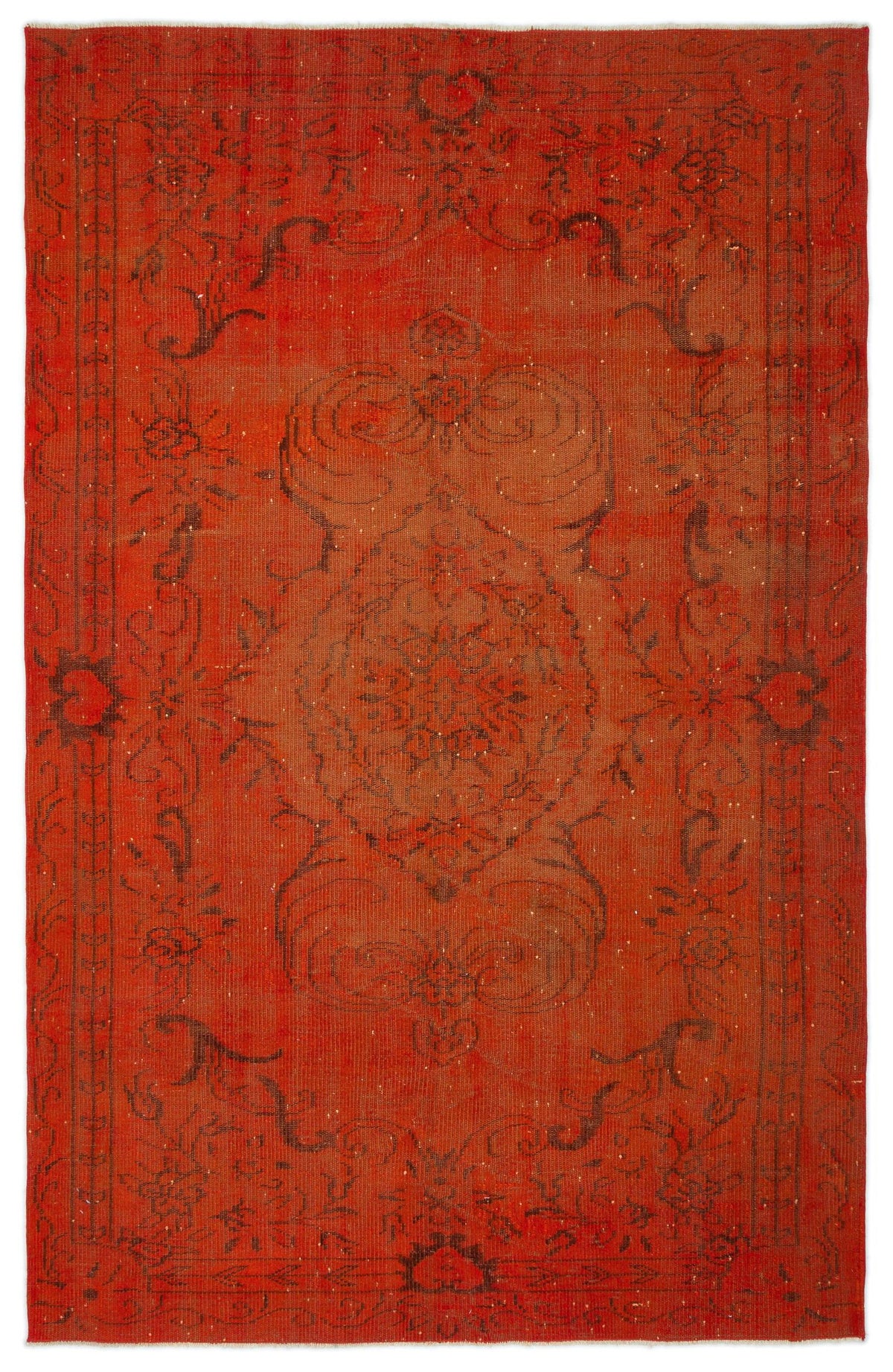 Distressed red rug with a dark charcoal floral medallion and ornate border pattern on a white background.