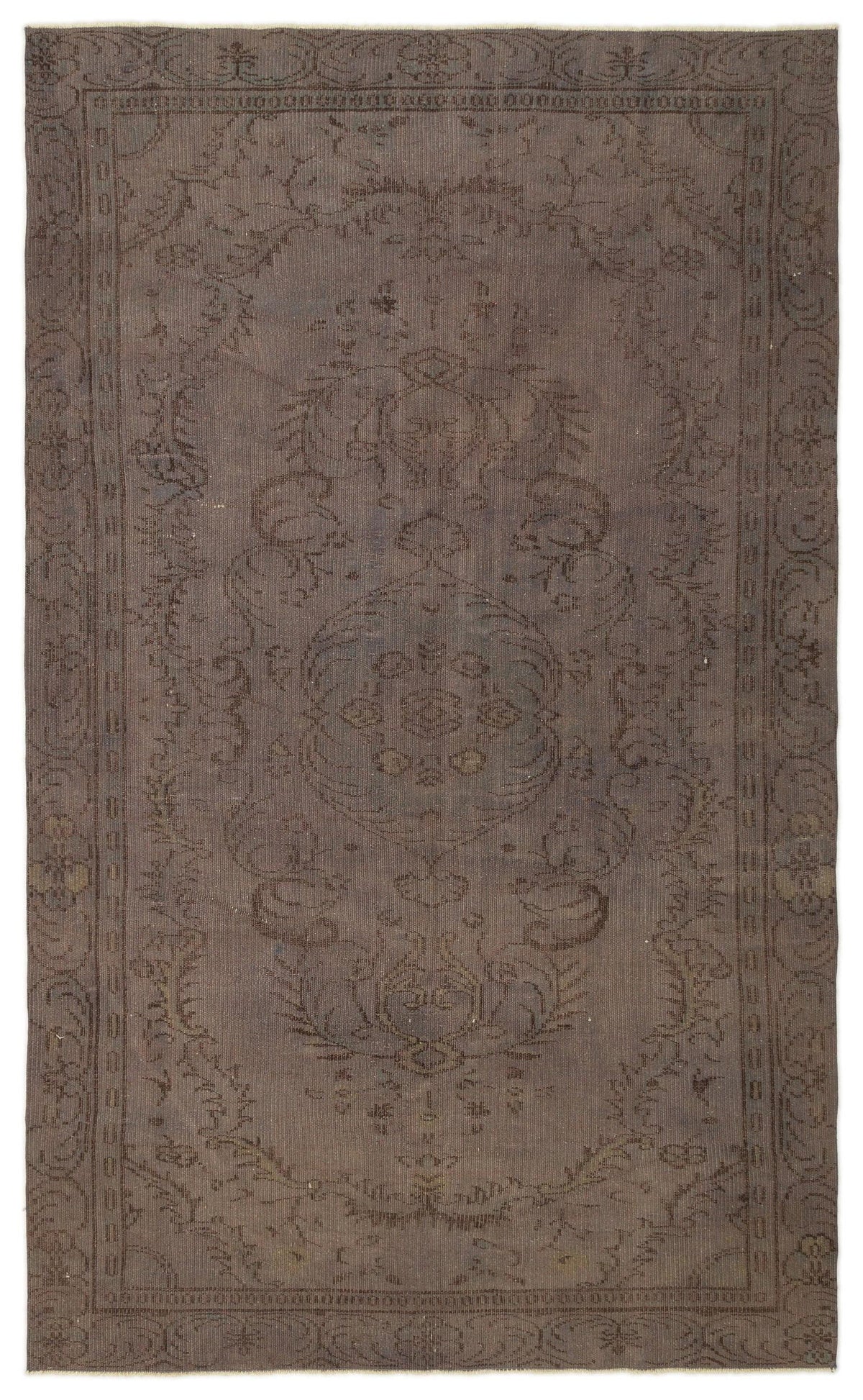 Monochromatic dark brown rug with a subtle, distressed traditional floral medallion pattern and a decorative border.