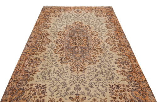 Load image 1 in gallery view. Beige, orange, and grey traditional rug with a central floral medallion and ornate border on a white background.