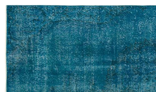 Load image 1 in gallery view. Teal distressed rug with a faded, worn-in texture and subtle dark charcoal ornamental outlines.