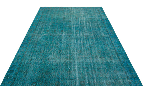 Load image 1 in gallery view. Teal distressed area rug with a faded traditional medallion pattern on a white background.