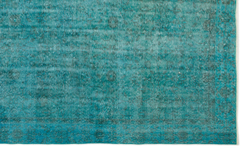 Load image 1 in gallery view. Teal distressed rug with a faded traditional medallion pattern and a visible border on a white background.
