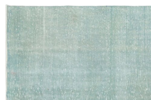 Load image 1 in gallery view. Solid light blue rug with a distressed, weathered texture on a white background.