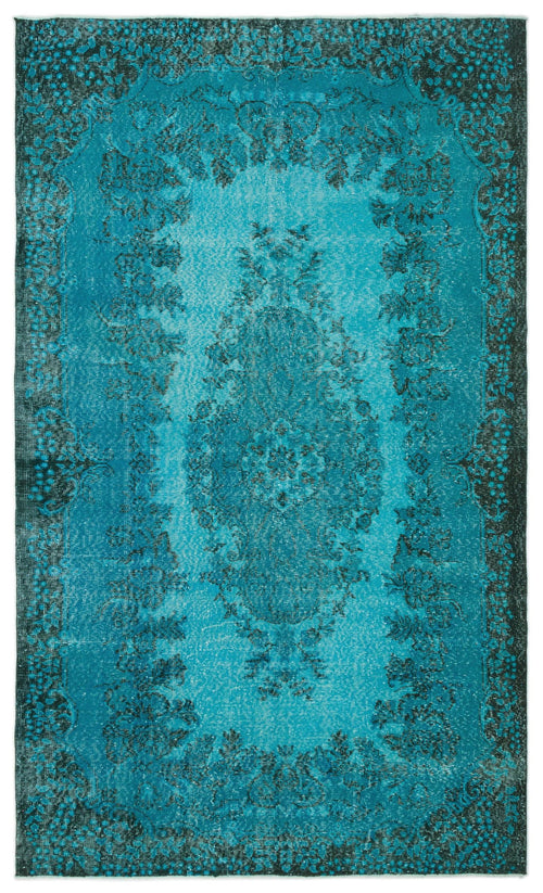 Load image 1 in gallery view. Teal and black distressed area rug with a traditional central floral medallion and ornate border.