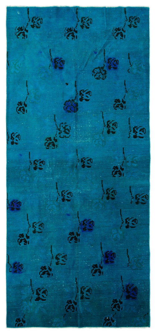 Load image 1 in gallery view. Teal runner rug with a scattered black and dark blue floral pattern on a white background.
