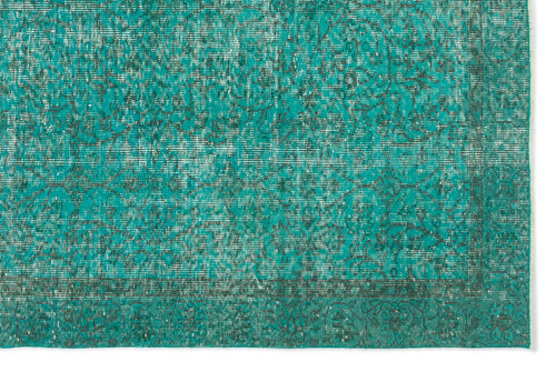 Load image 1 in gallery view. Teal and dark grey distressed rug with a traditional floral medallion pattern and a bordered edge.