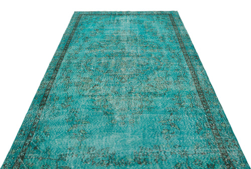 Load image 1 in gallery view. Distressed turquoise and black traditional rug with a central medallion and ornate border on a white background.
