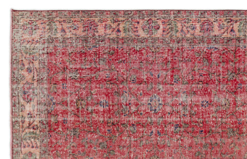 Load image 1 in gallery view. Red and peach distressed traditional rug with a faded floral medallion pattern and a decorative border.