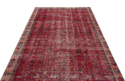 Load image 1 in gallery view. Distressed red vintage-style rug with a faded traditional medallion pattern and intricate floral borders.