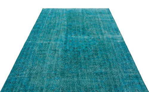 Load image 1 in gallery view. Teal distressed vintage-style rug with a faded traditional medallion pattern on a white background.