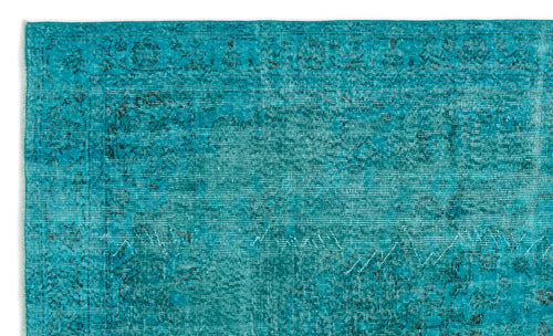 Load image 1 in gallery view. Teal distressed rug with a faded traditional floral medallion pattern and a bordered edge.