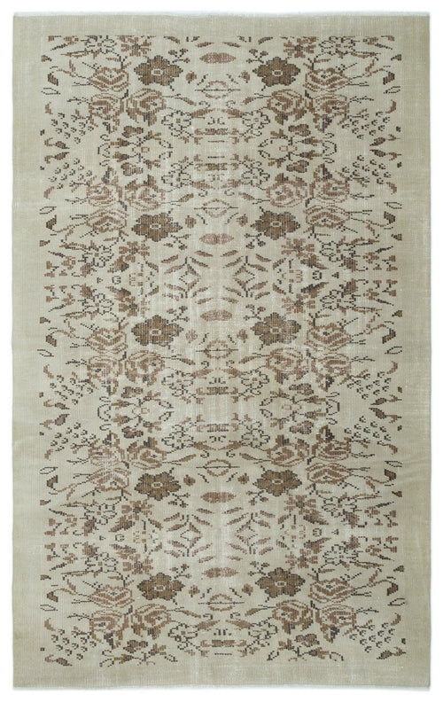 Load image 1 in gallery view. Beige and brown distressed rug with a symmetrical floral and geometric pattern on a white background.