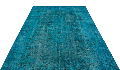 Load image 1 in gallery view. Teal distressed area rug with a faded traditional medallion pattern on a white background.