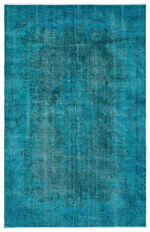 Load image 1 in gallery view. Teal distressed vintage-style rug with a faint, dark floral medallion pattern.