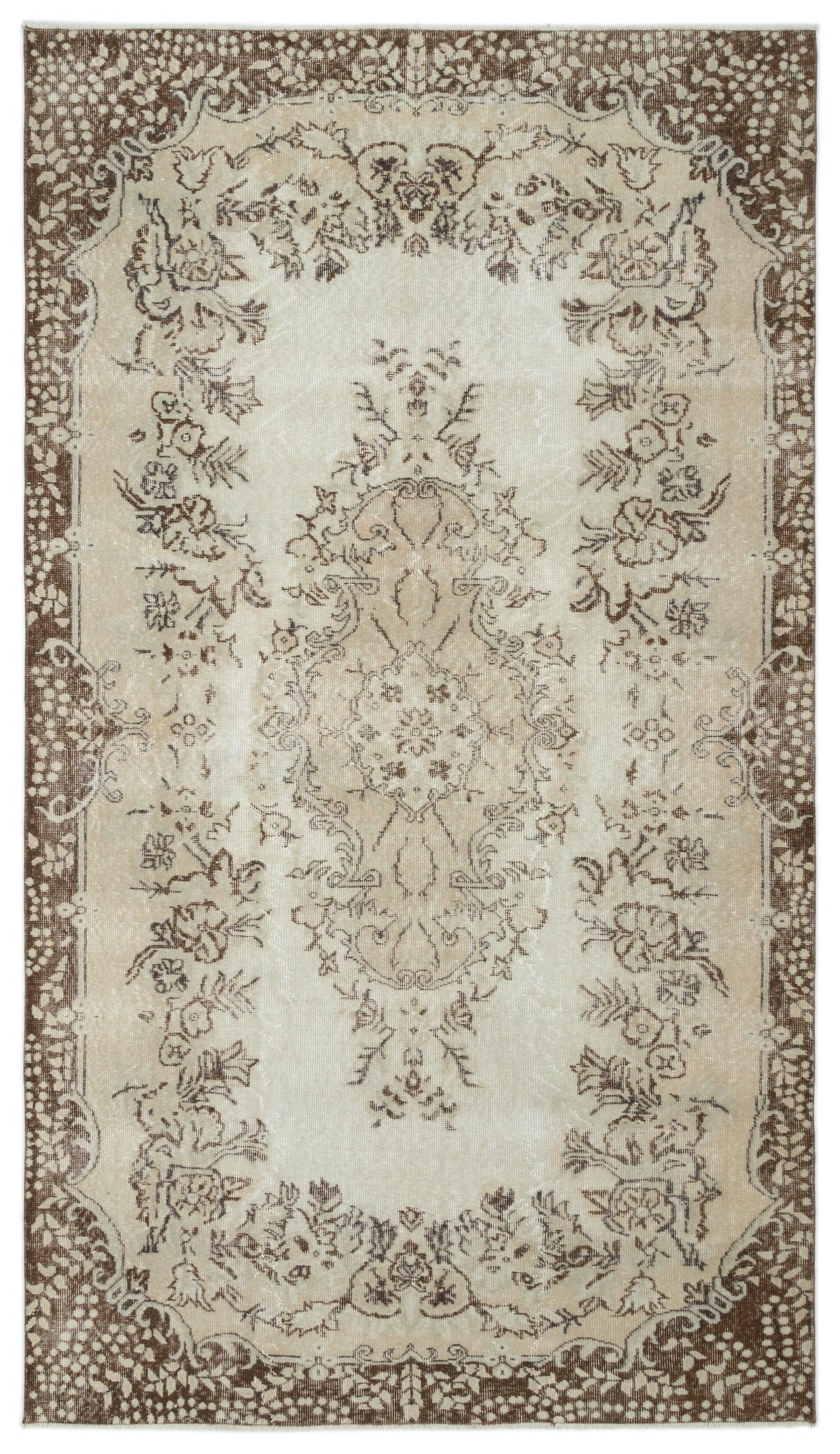 Beige and brown vintage-style rug with a central floral medallion and a decorative border on a white background.