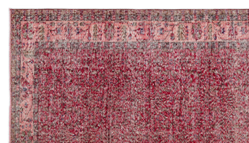Load image 1 in gallery view. Distressed deep red and pink vintage-style rug with a dark border and faded floral motif.