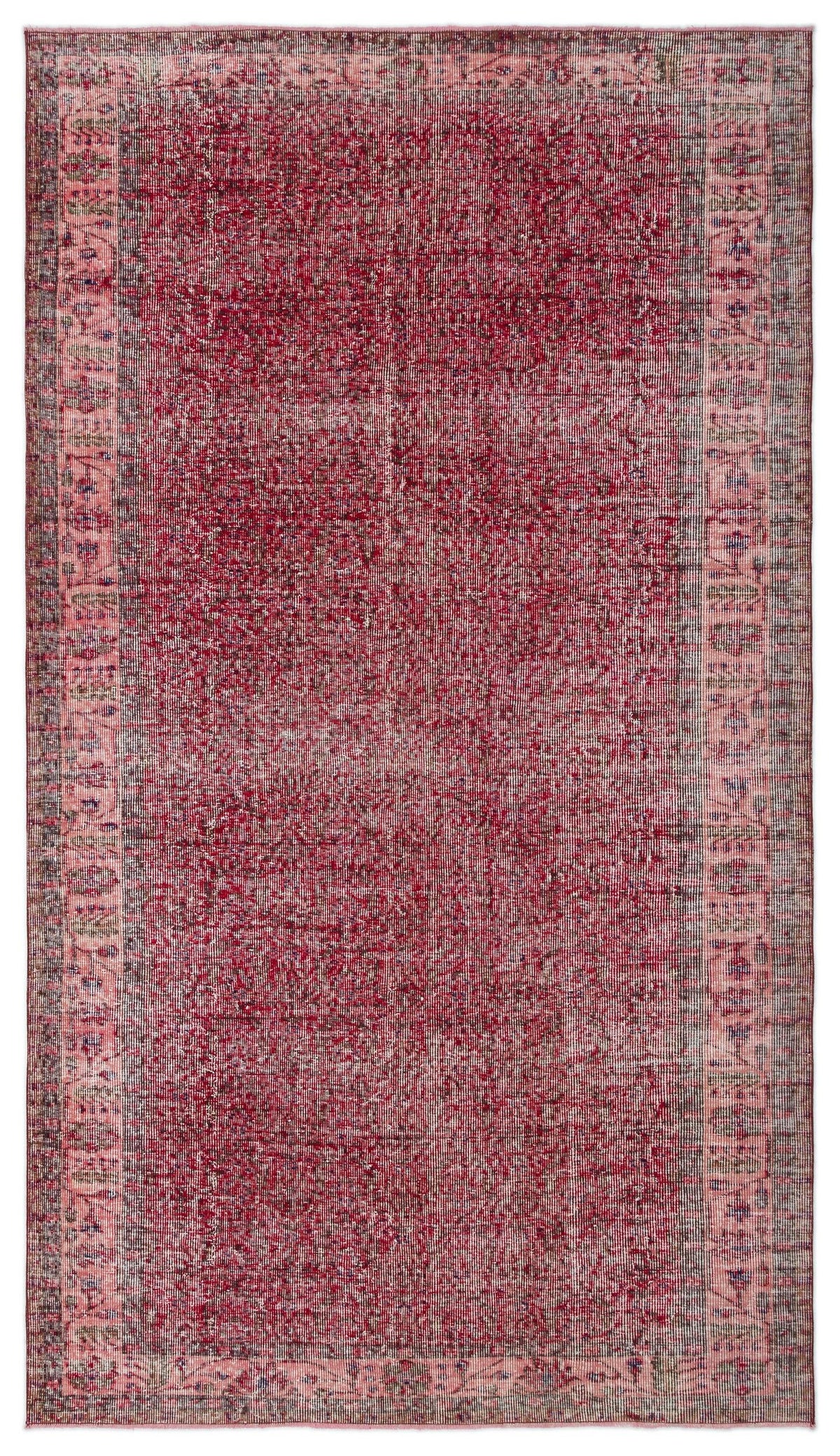 Distressed deep red rug with a faded central field and a decorative border in muted pink and charcoal tones.