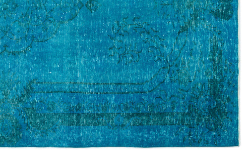 Load image 1 in gallery view. Bright turquoise rug with a distressed, dark teal traditional floral medallion pattern.