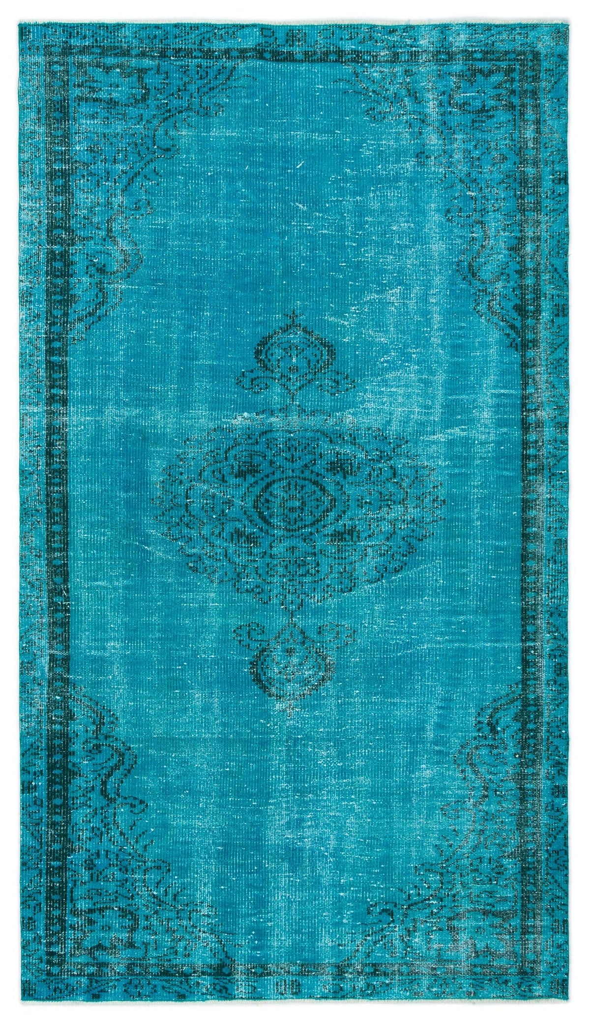 Bright turquoise distressed rug with a dark charcoal central medallion and ornate border pattern.