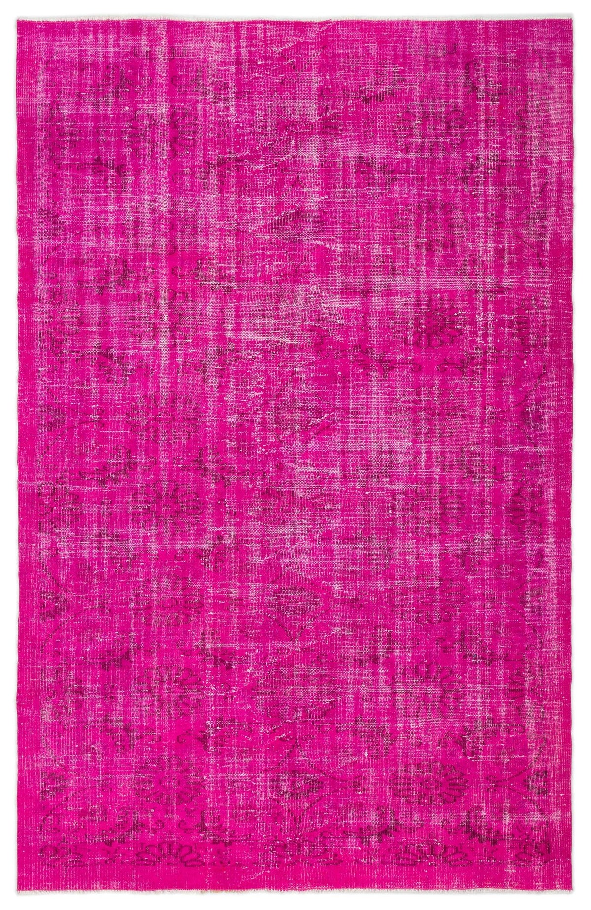 Fuchsia overdyed vintage rug with a faint, distressed traditional floral medallion pattern.
