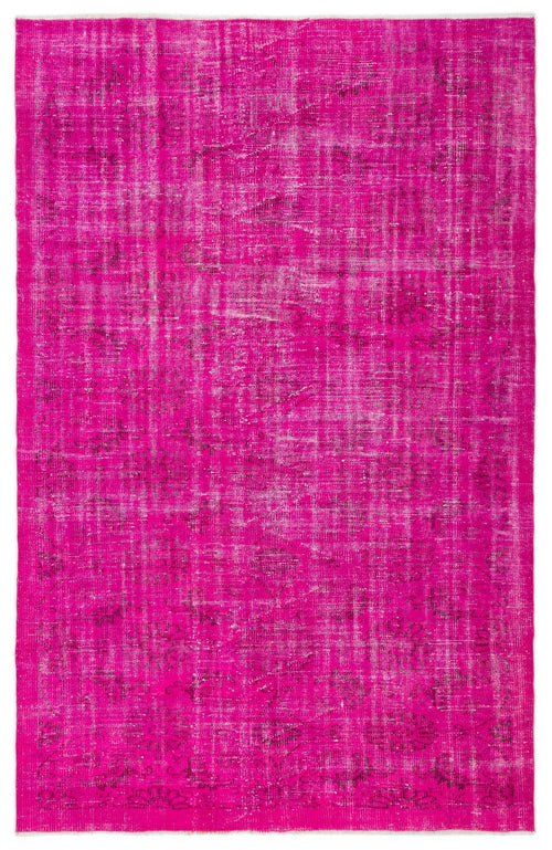 Load image 1 in gallery view. Fuchsia overdyed vintage rug with a faint, distressed traditional floral medallion pattern.