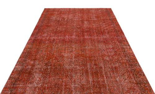 Load image 1 in gallery view. Distressed terracotta red vintage-style rug with a faded, intricate traditional pattern on a white background.