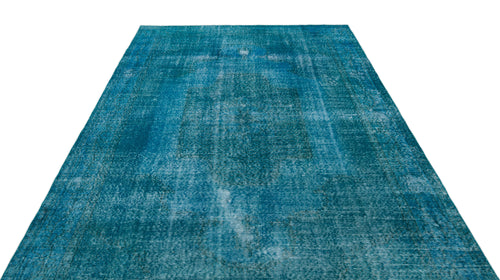Load image 1 in gallery view. Teal distressed vintage-style rug with a faded central medallion pattern on a white background.