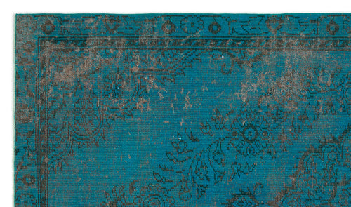 Load image 1 in gallery view. Teal and charcoal distressed rug with a traditional floral medallion border and ornate pattern.