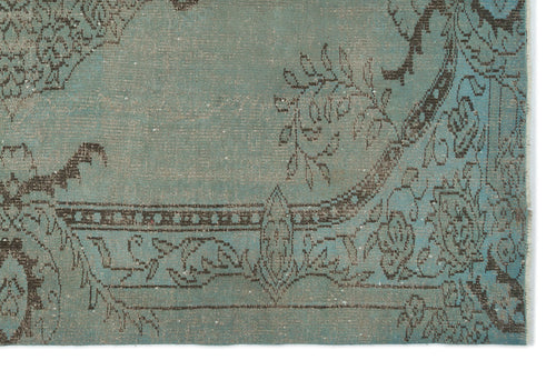 Load image 1 in gallery view. Distressed teal rug with a dark brown traditional floral medallion and border pattern.