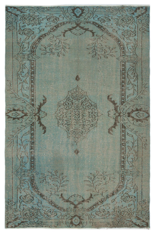 Load image 1 in gallery view. Distressed teal rug with a dark brown central medallion and ornate floral border on a white background.