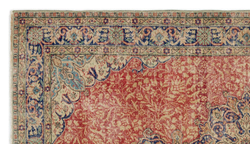 Load image 1 in gallery view. Red, blue, and beige traditional Persian-style rug with a dense floral pattern and intricate multi-layered border.