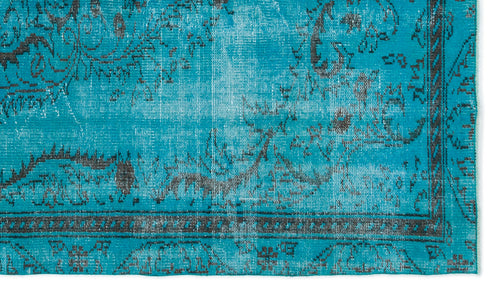 Load image 1 in gallery view. Bright turquoise rug with a distressed charcoal grey traditional floral pattern and a geometric border.