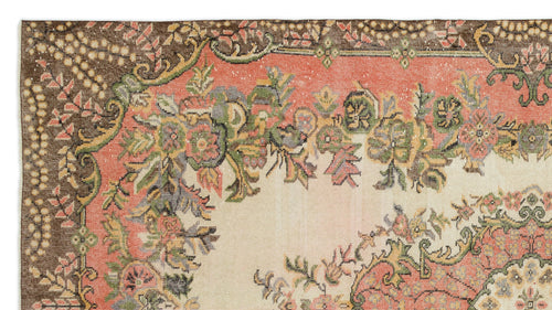 Load image 1 in gallery view. Vintage-style rug with a cream center, coral border, and intricate floral medallion pattern in green, brown, and pink.